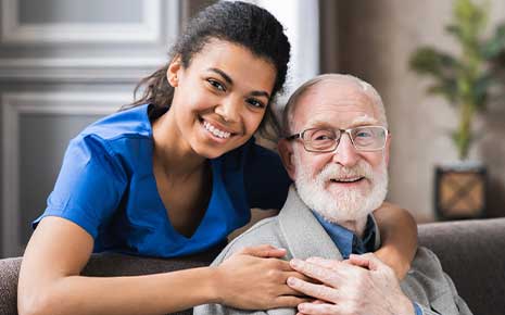 assisted living healthcare professional and resident