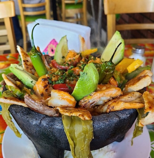 traditional mexican bowl with meat and vegetables